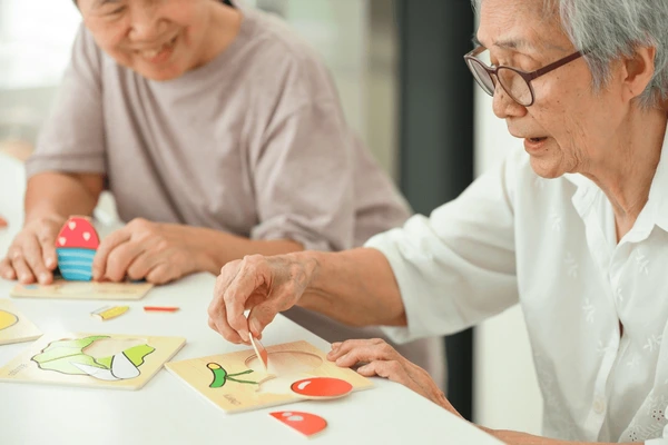 happy-asian-senior-woman-holding-600nw-2136424229